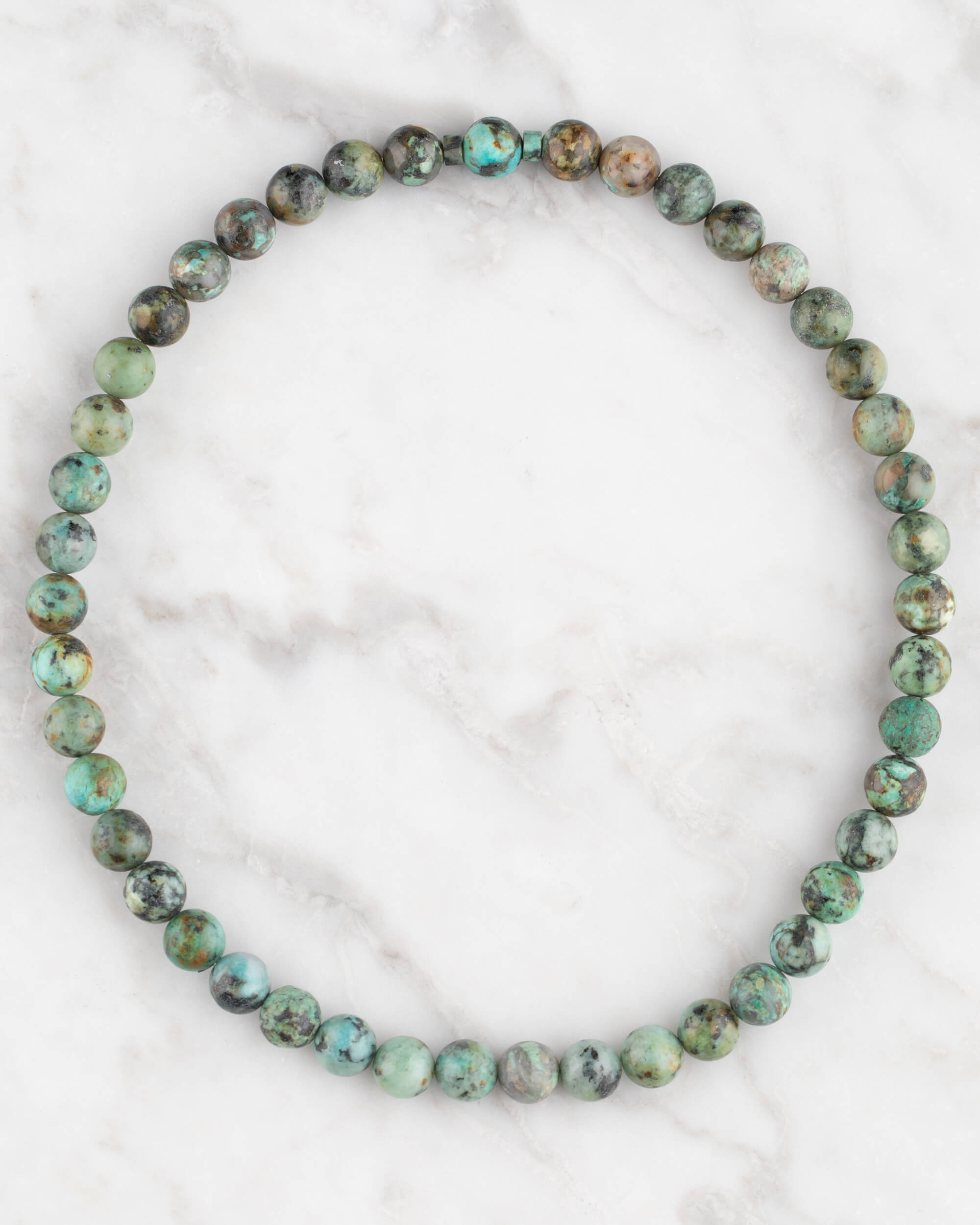 Codificador de Mano Turquesa Africana 34 cm - Evolución y Voz Veraz (Agesta)