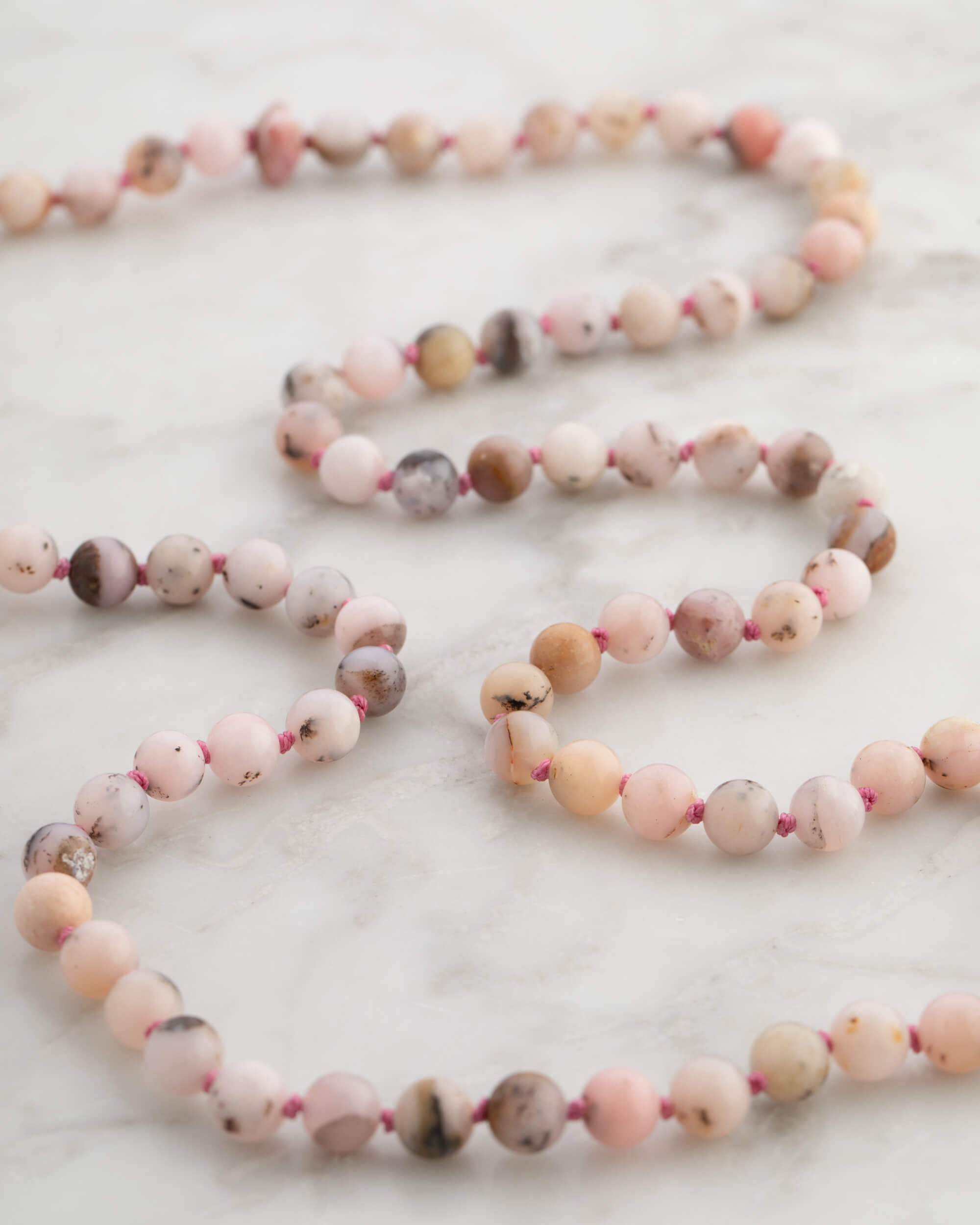 Codificador Doble Ópalo Rosa y Rodonita 90 Cuentas - Ternura y Estructura (Agesta)