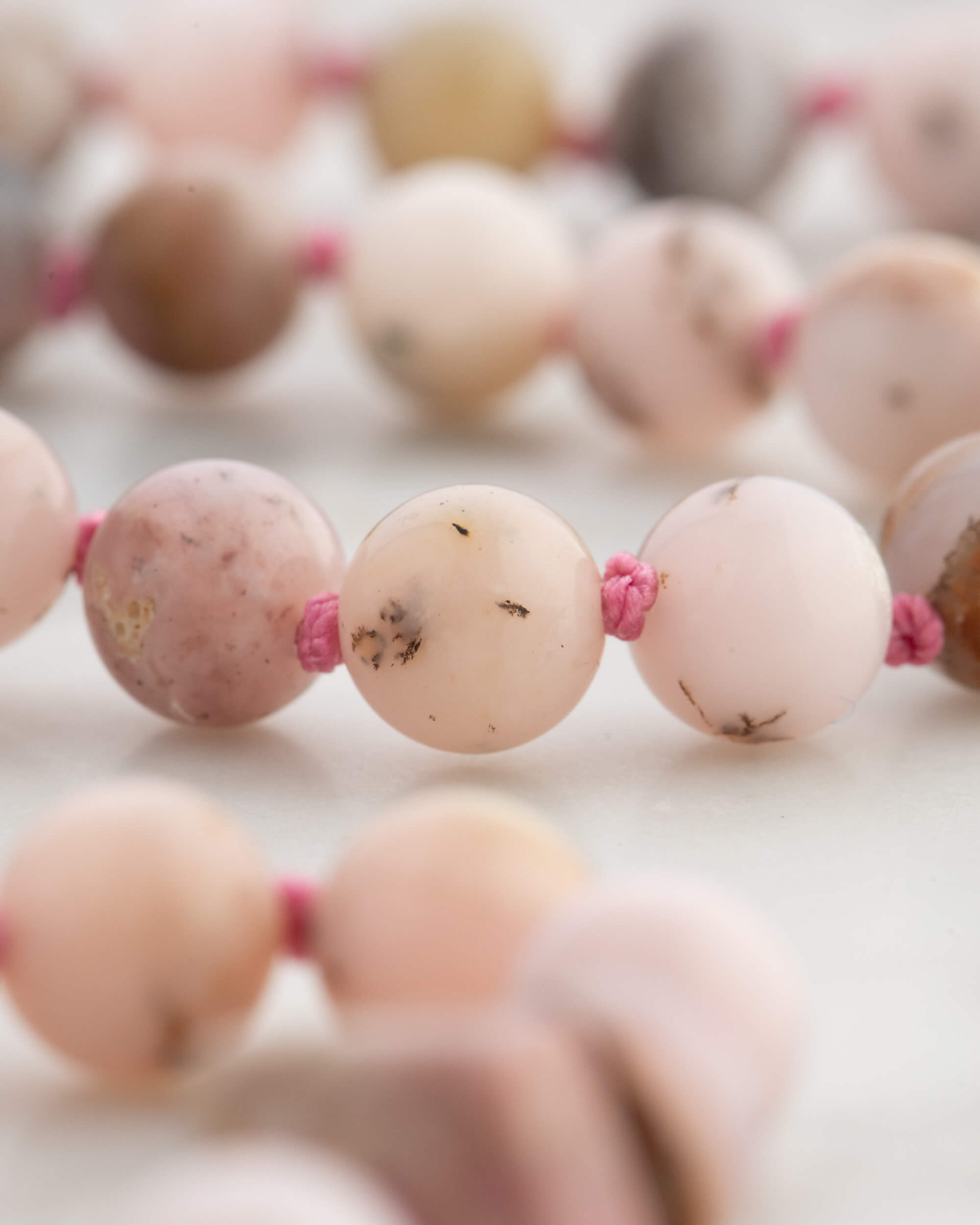 Codificador Doble Ópalo Rosa y Rodonita 90 Cuentas - Ternura y Estructura (Agesta)