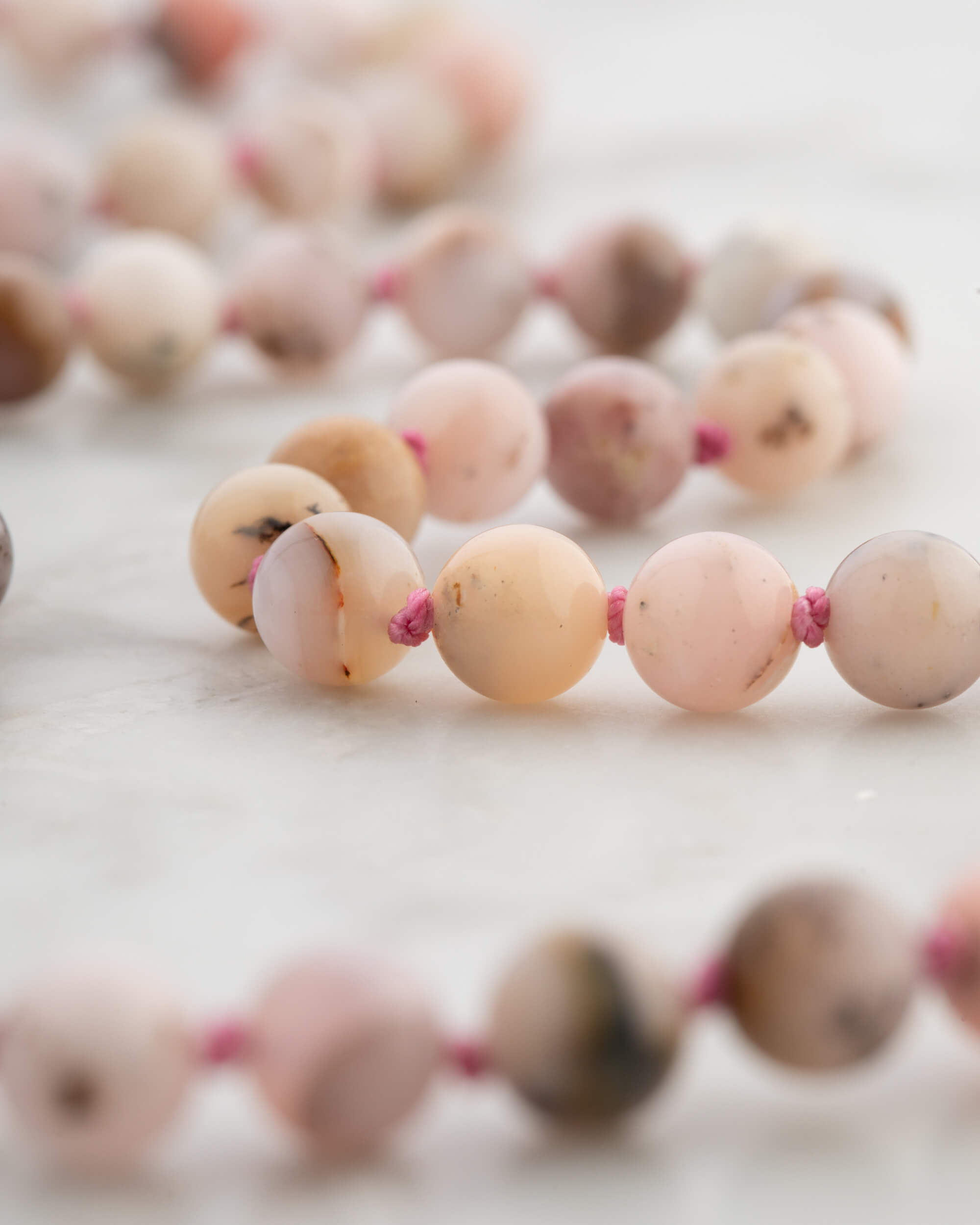 Codificador Doble Ópalo Rosa y Rodonita 90 Cuentas - Ternura y Estructura (Agesta)