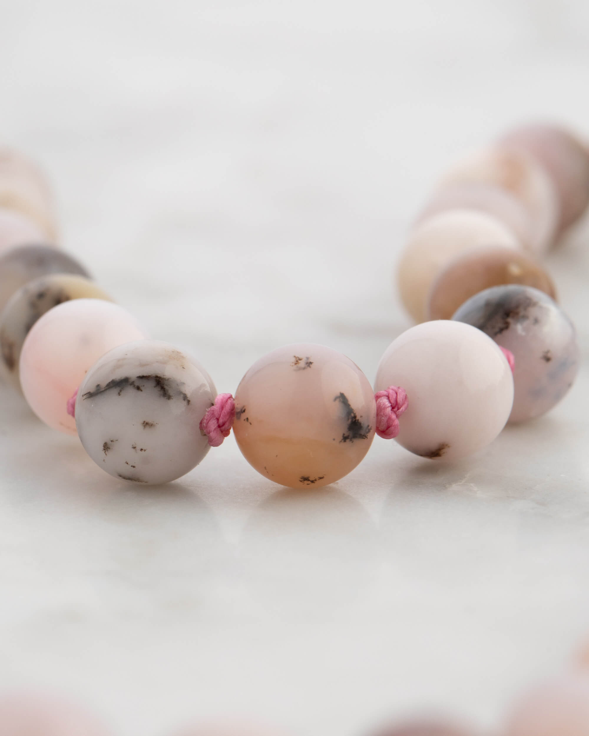 Codificador Doble Ópalo Rosa y Rodonita 90 Cuentas - Ternura y Estructura (Agesta)