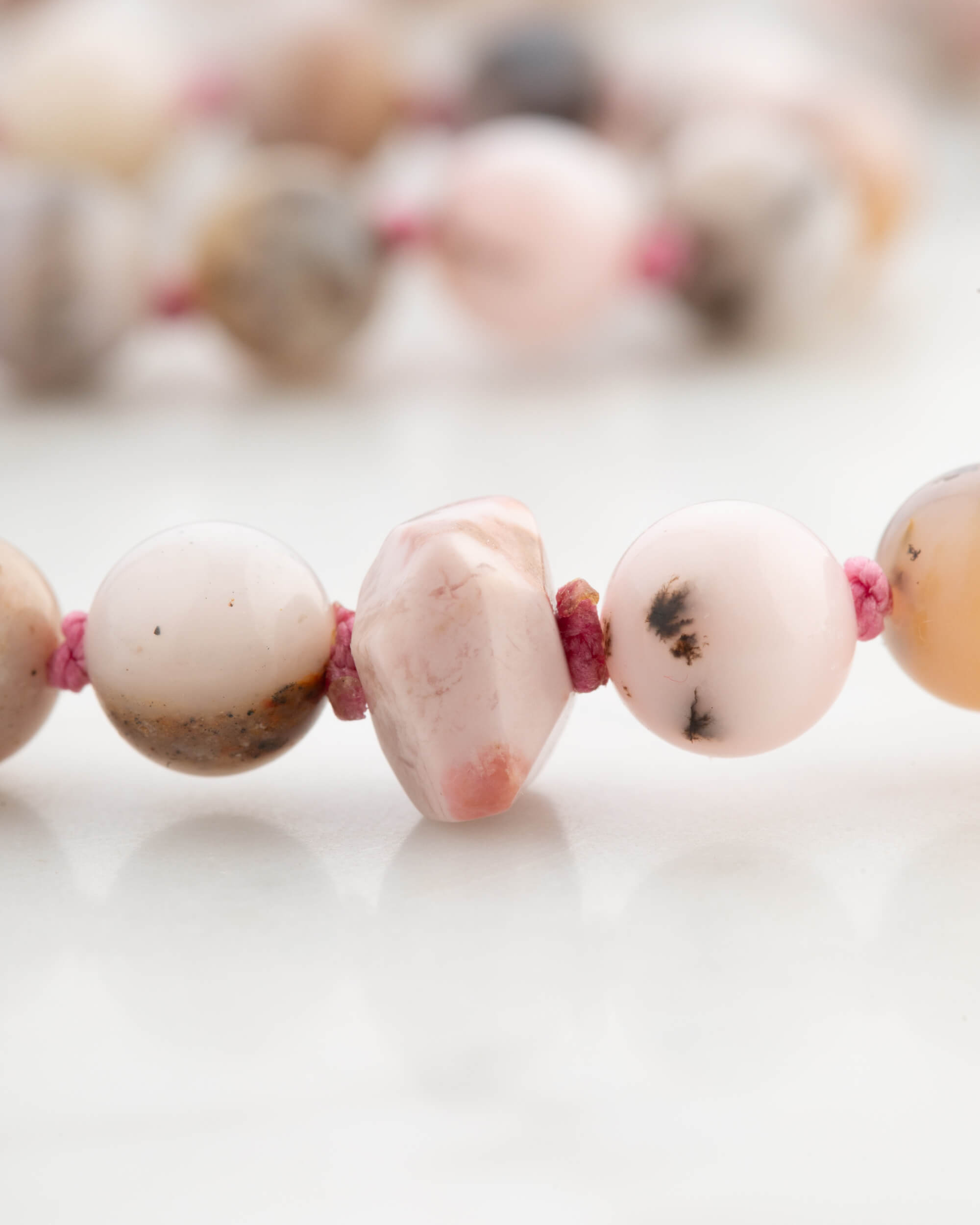 Codificador Doble Ópalo Rosa y Rodonita 90 Cuentas - Ternura y Estructura (Agesta)