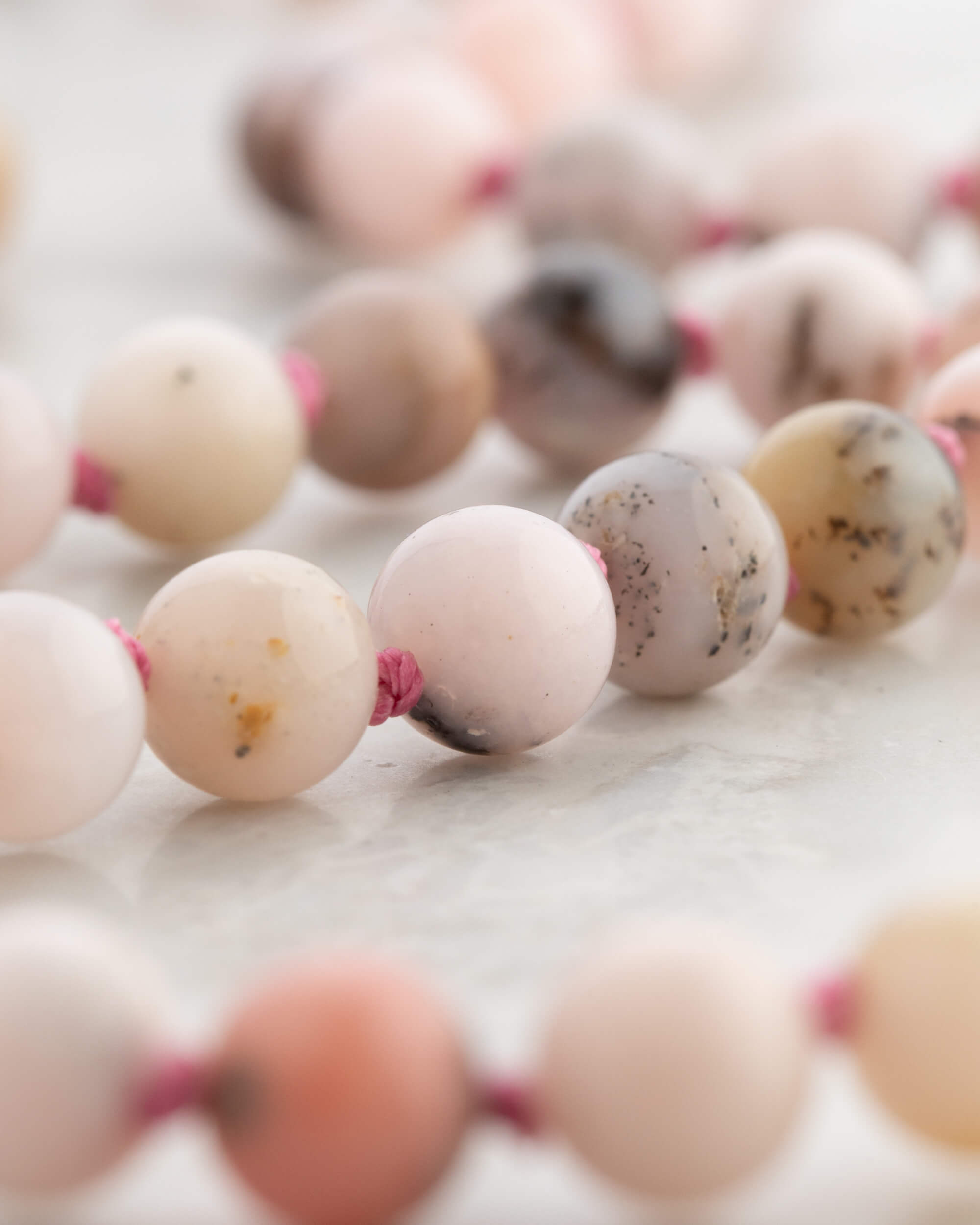 Codificador Doble Ópalo Rosa y Rodonita 90 Cuentas - Ternura y Estructura (Agesta)