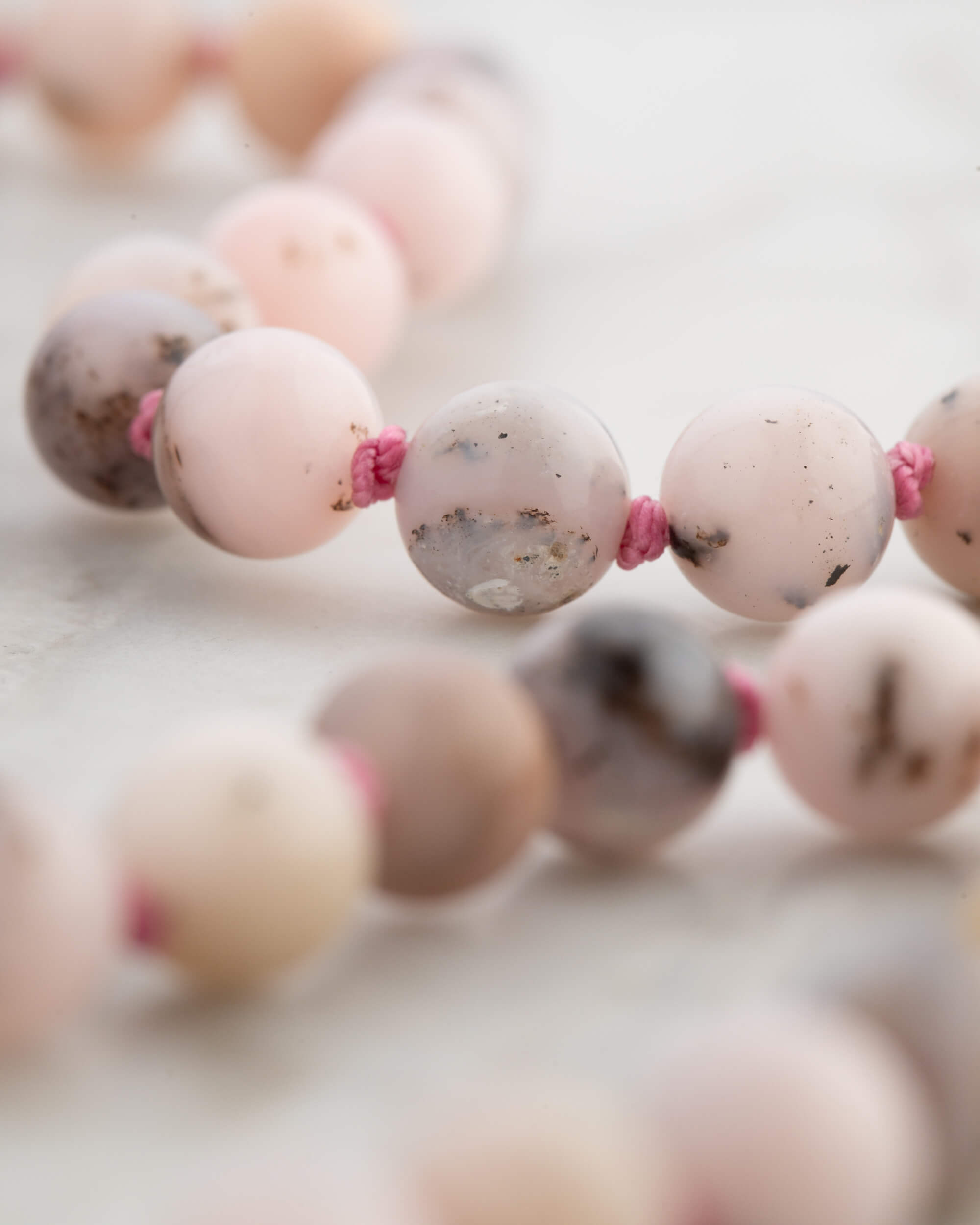 Codificador Doble Ópalo Rosa y Rodonita 90 Cuentas - Ternura y Estructura (Agesta)