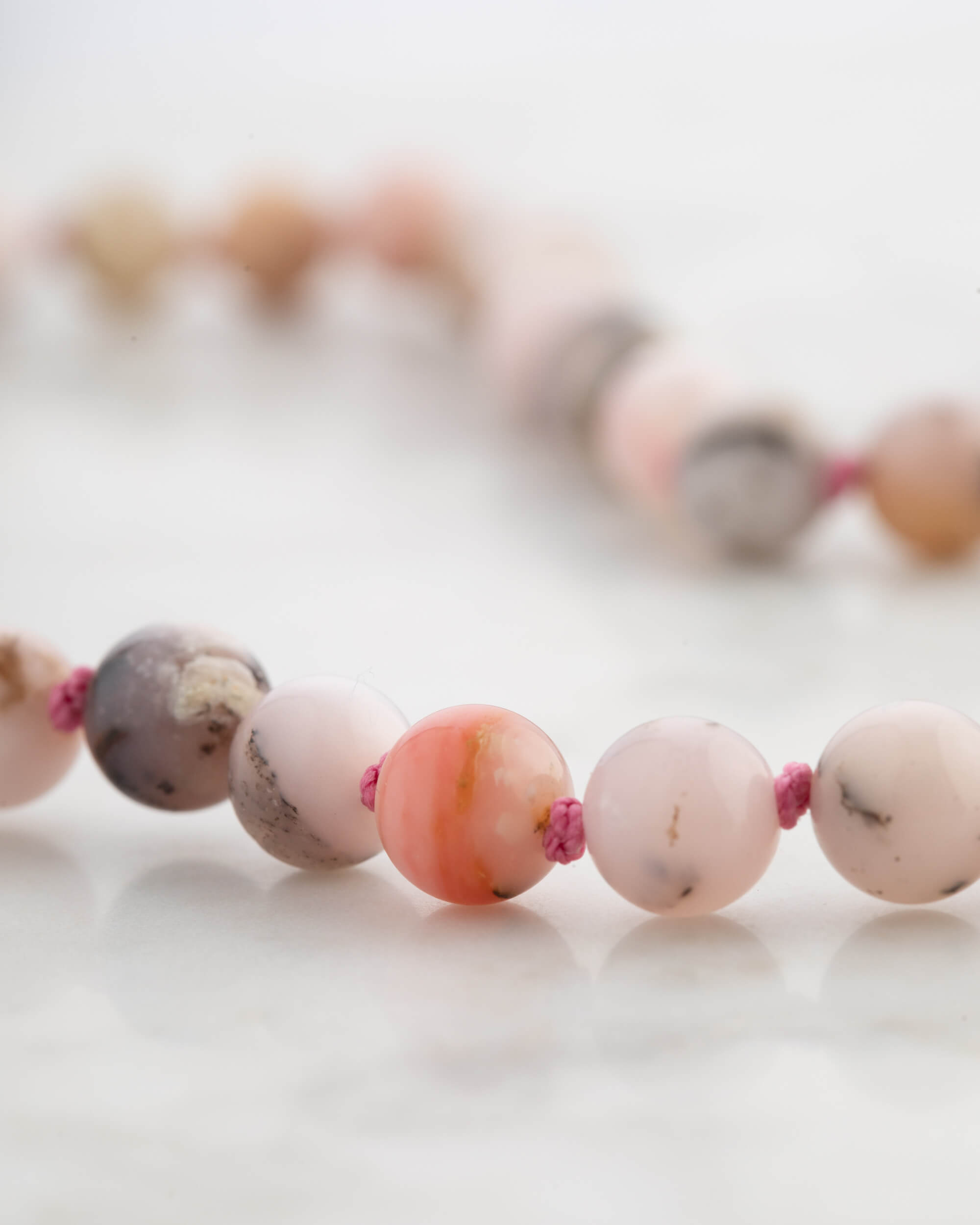 Codificador Doble Ópalo Rosa y Rodonita 90 Cuentas - Ternura y Estructura (Agesta)