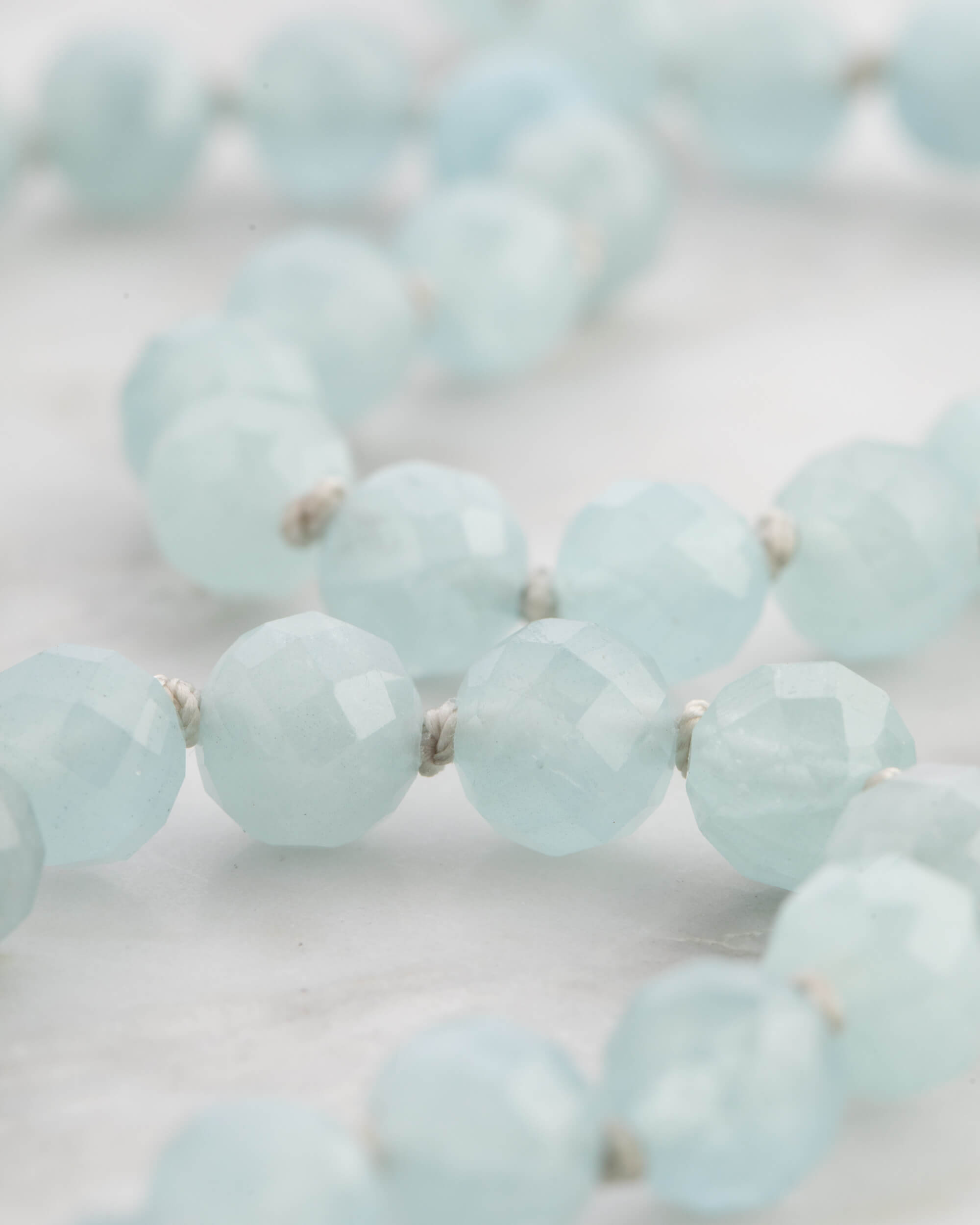 Codificador Doble de Aguamarina y Turmalina Negra (8 mm)