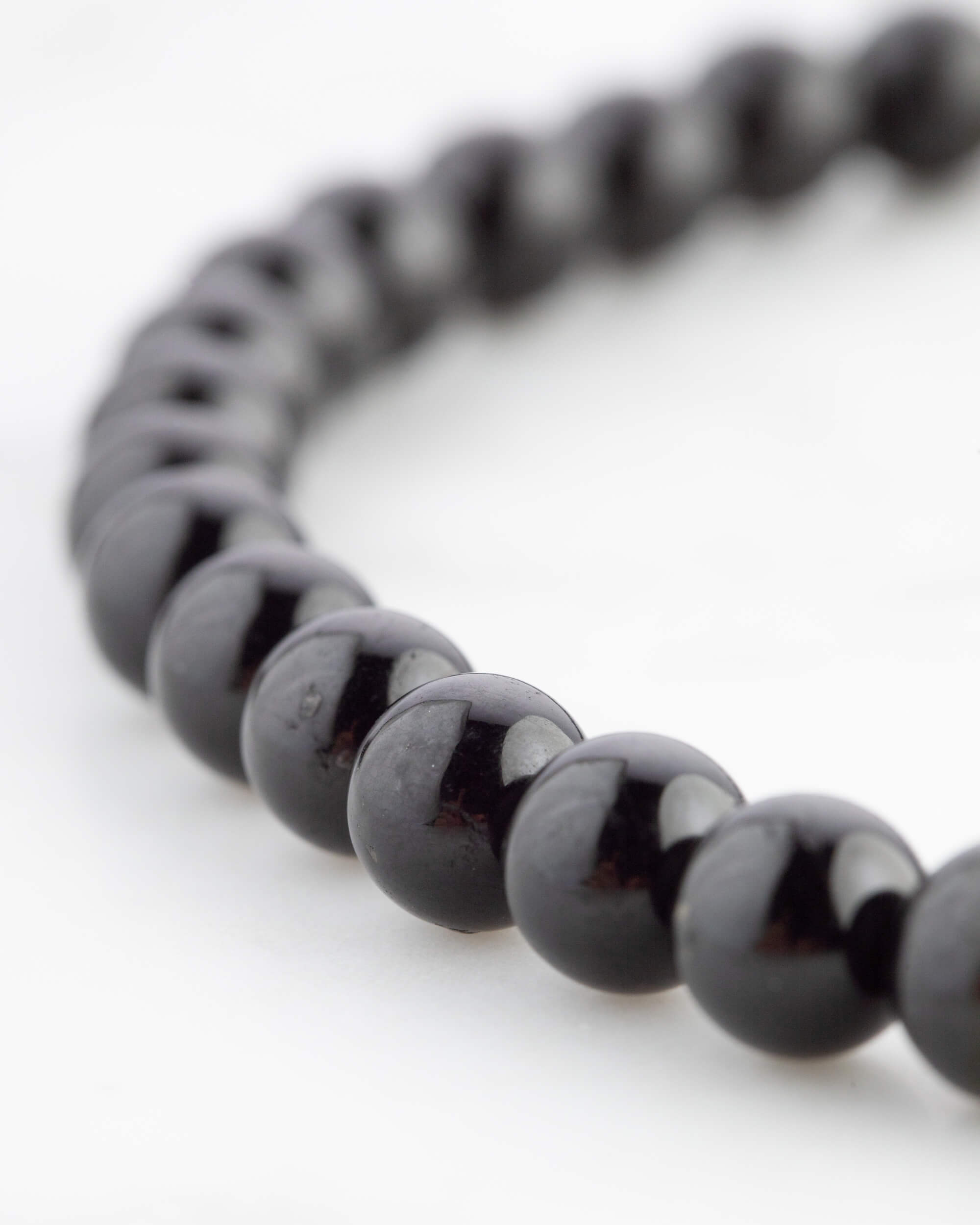 Codificador de Mano Turmalina Negra 34 cm - Protección y Raíz (Agesta)