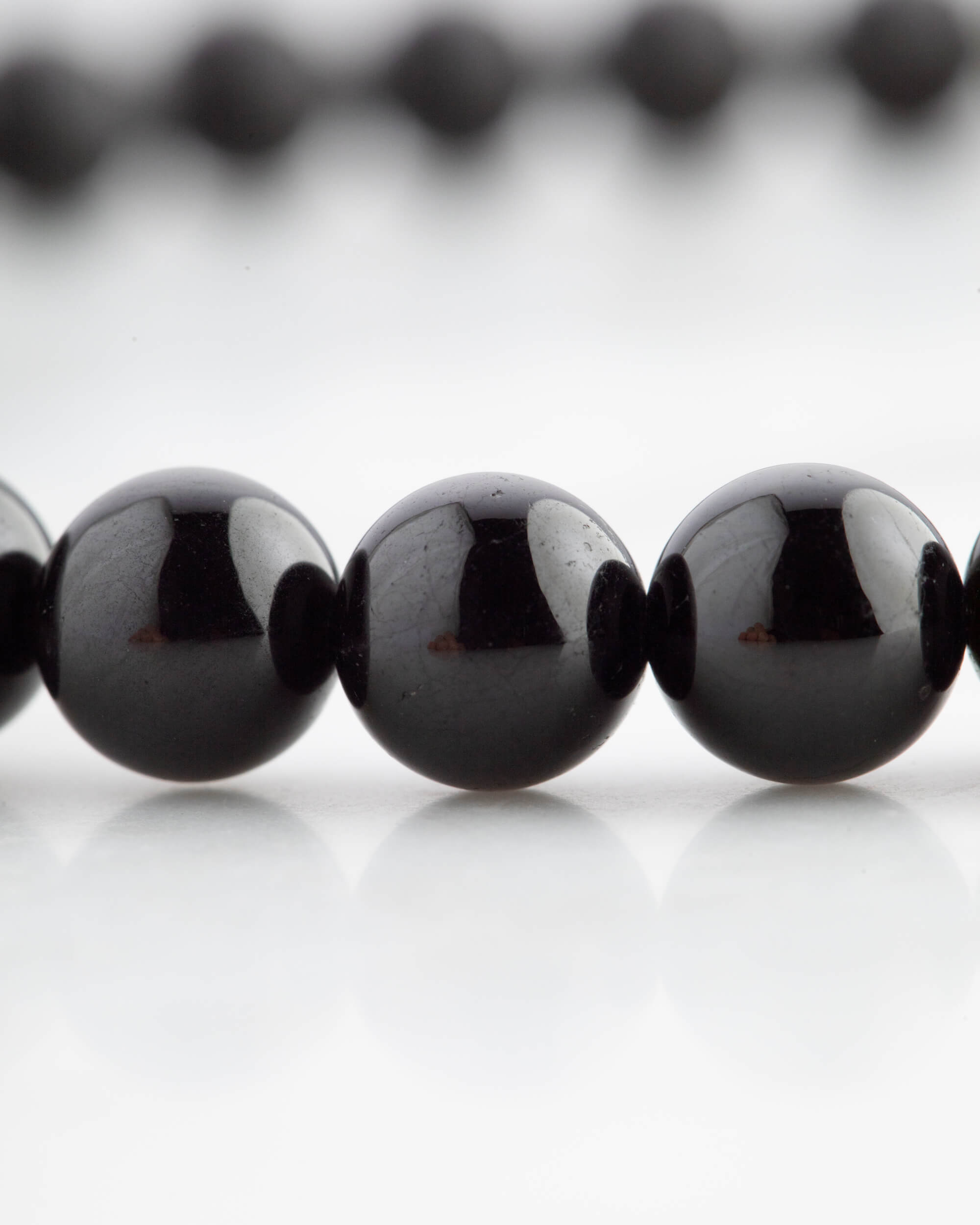 Codificador de Mano Turmalina Negra 34 cm - Protección y Raíz (Agesta)