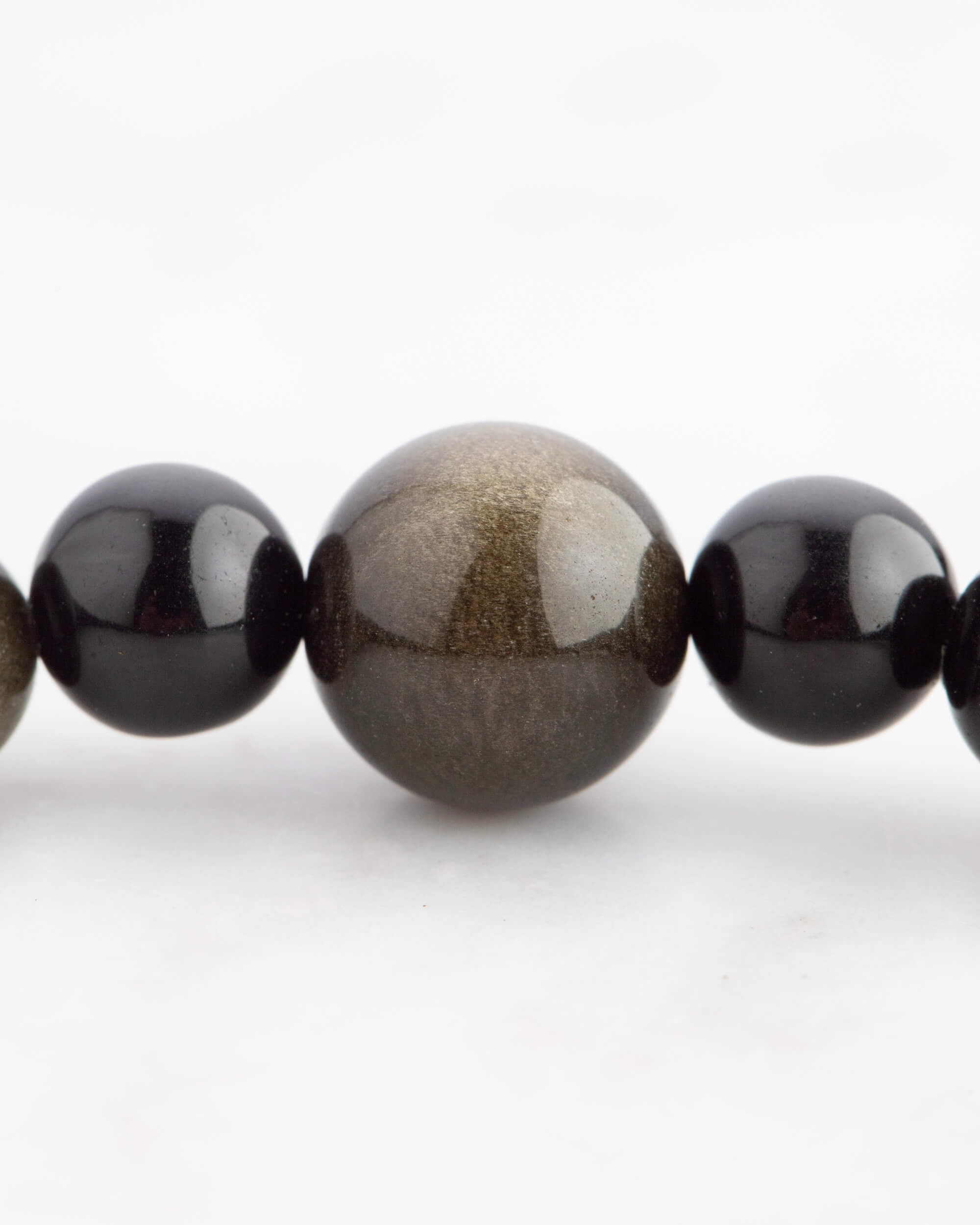 Codificador de Obsidiana Dorada (34 cm)