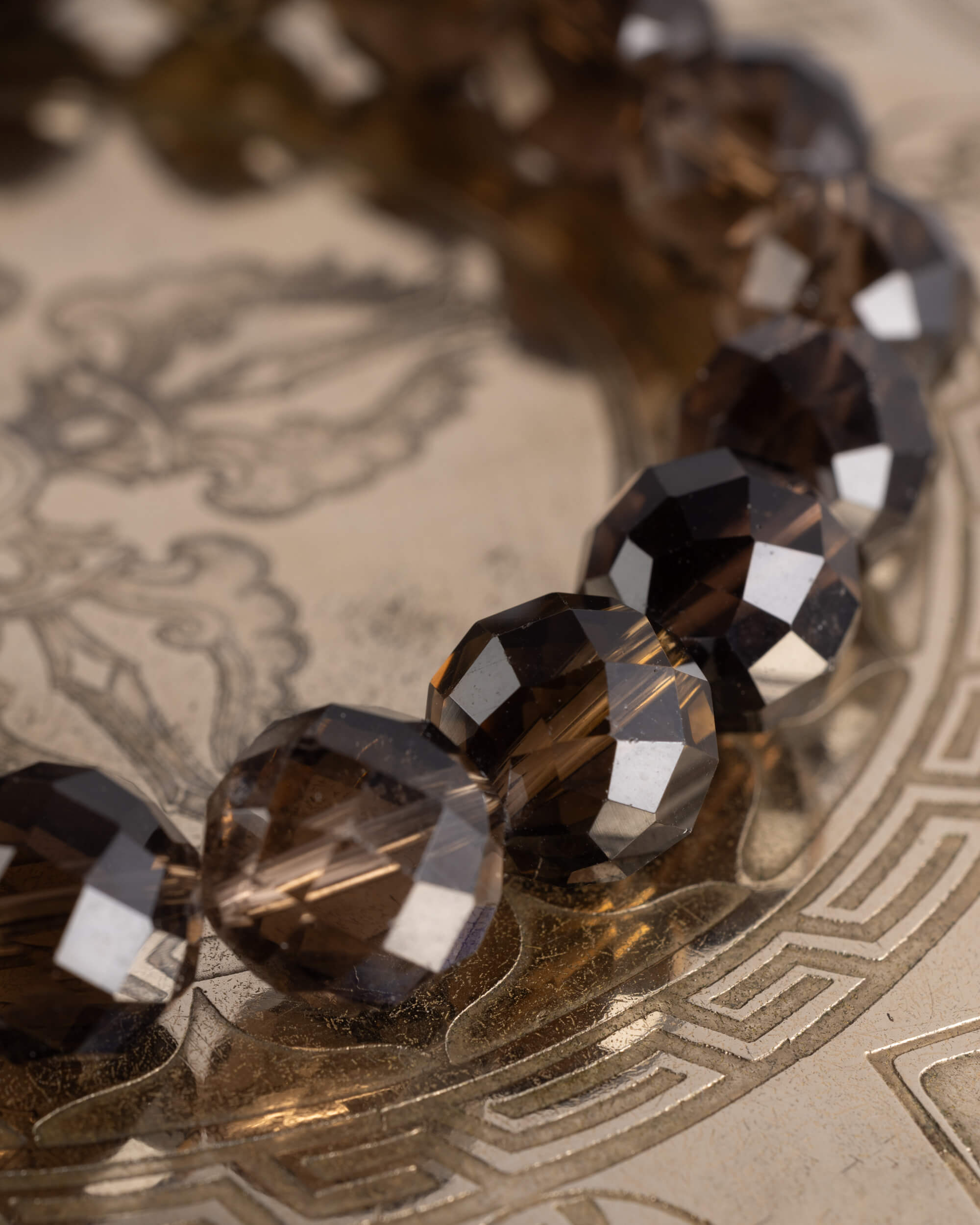 Pulsera de Cuarzo Ahumado Facetada 10 mm - Anclaje Profundo