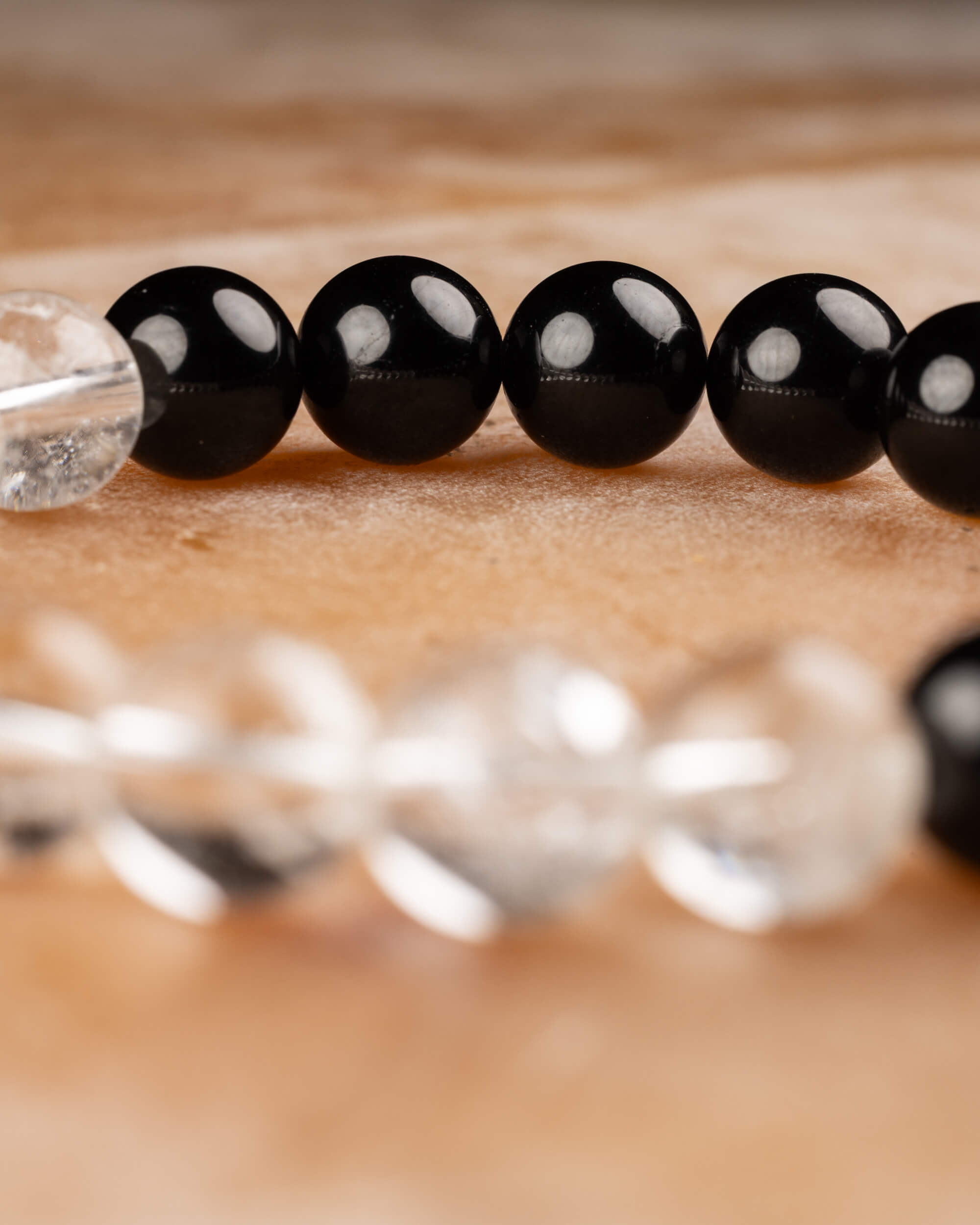 Pulsera de Turmalina Negra y Cuarzo Transparente 10 mm - Eje Anclado y Luz