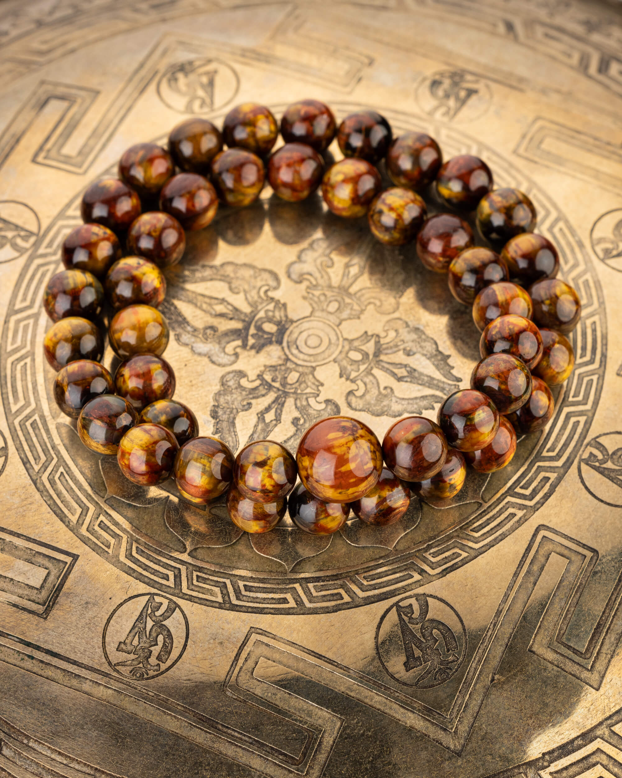 Codificador de Mano "Ojo del Infinito" 33 cm - Pietersita de Namibia (Agesta)