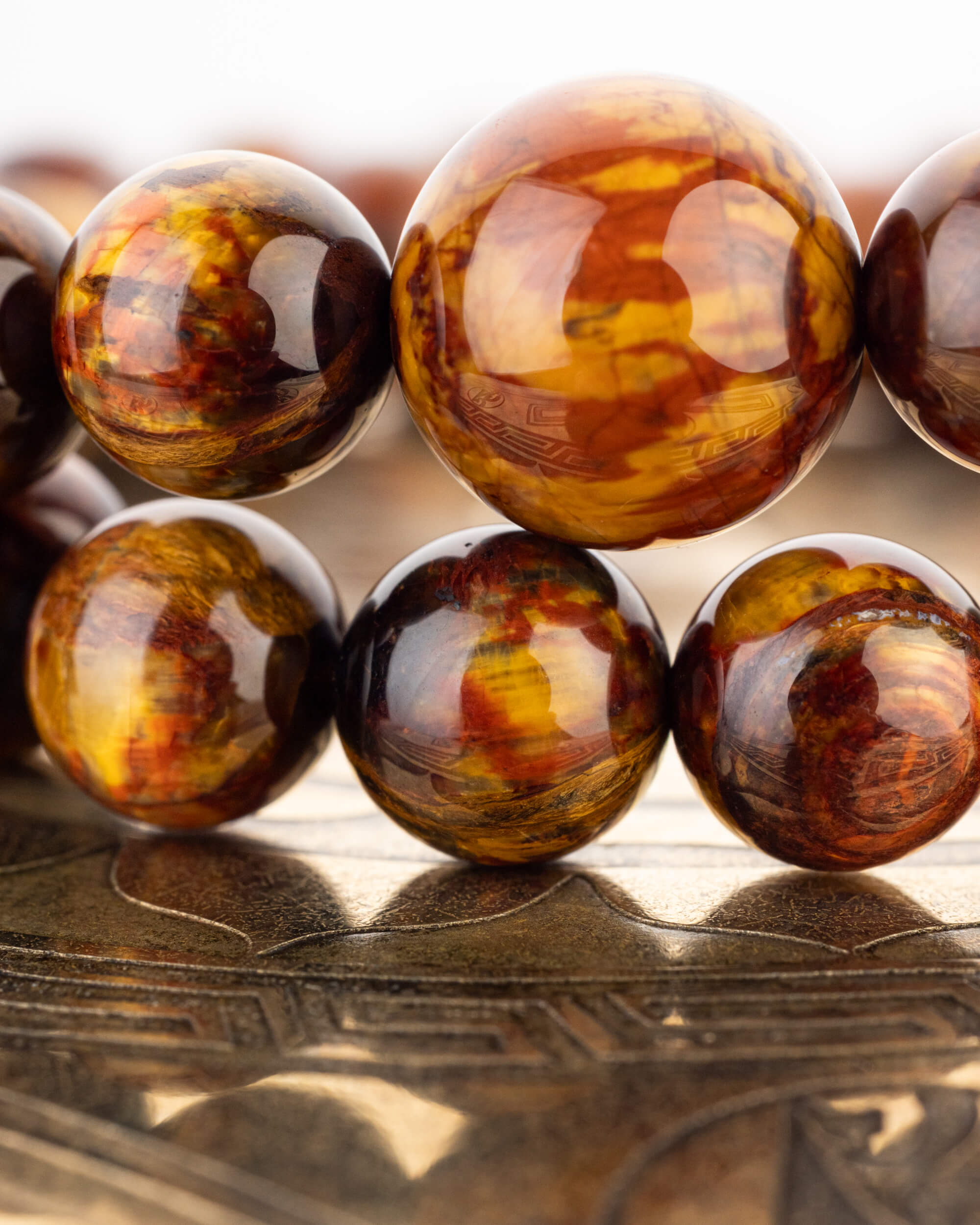 Codificador de Mano "Ojo del Infinito" 33 cm - Pietersita de Namibia (Agesta)