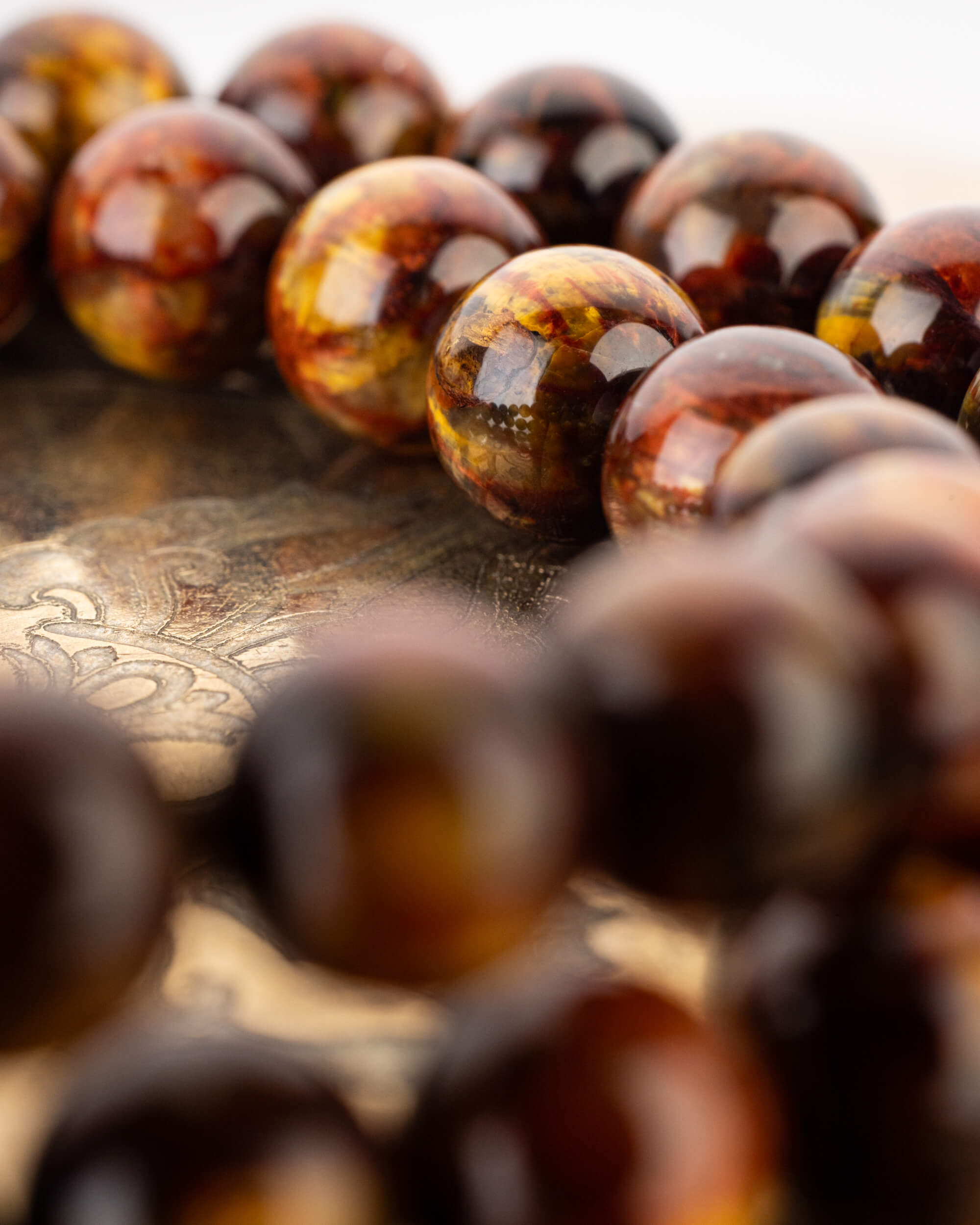 Codificador de Mano "Ojo del Infinito" 33 cm - Pietersita de Namibia (Agesta)