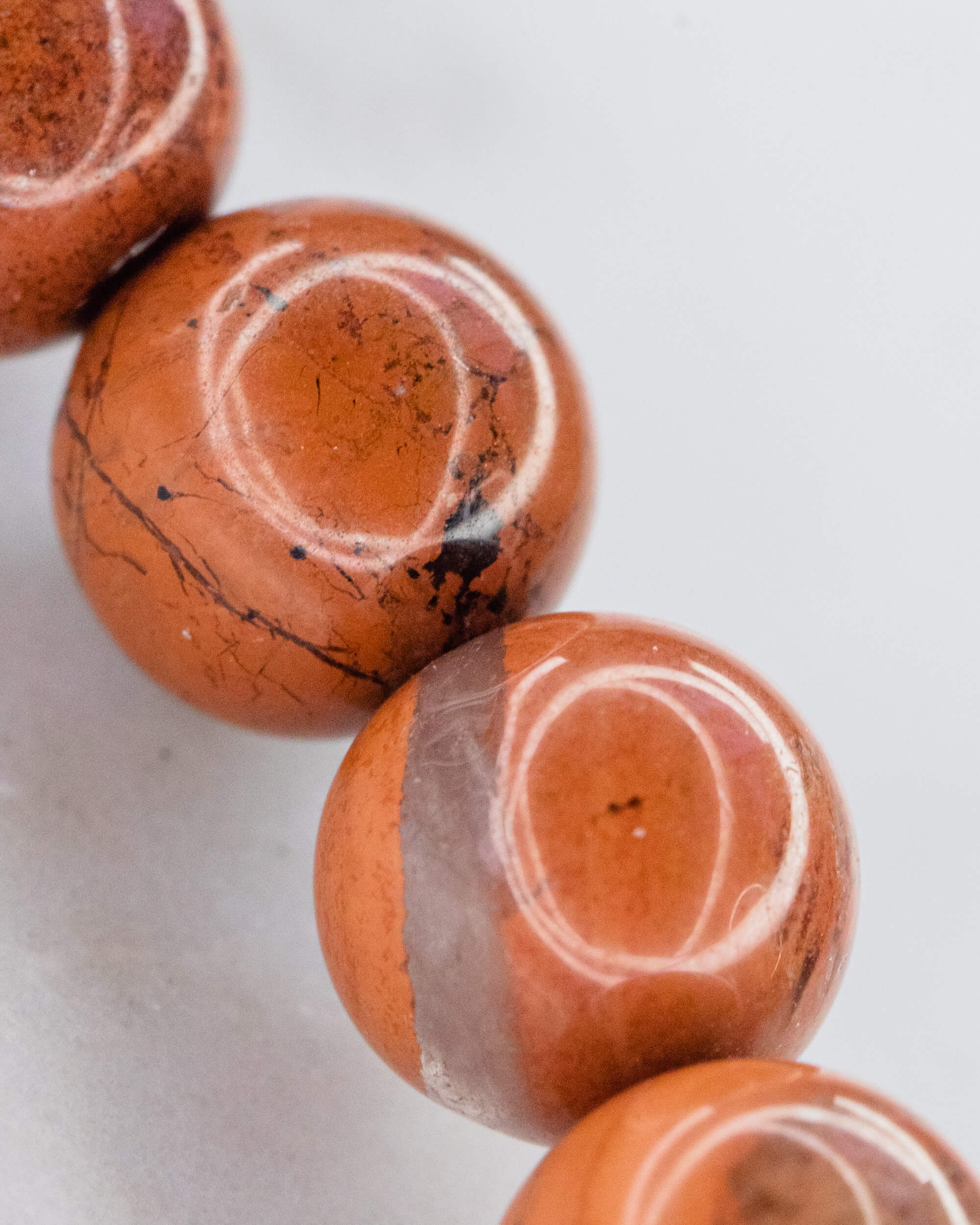 Codificador de Mano Jaspe Rojo 34 cm - Presencia y Raíz Viva (Agesta)