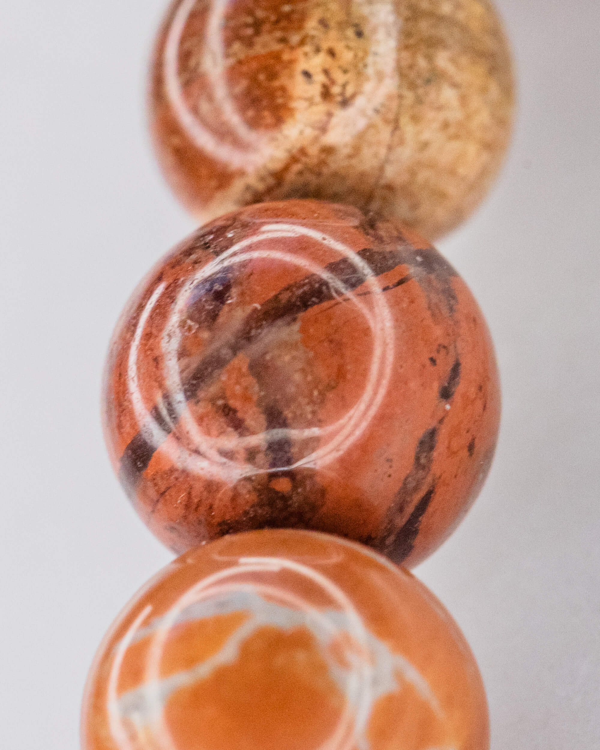 Codificador de Mano Jaspe Rojo 34 cm - Presencia y Raíz Viva (Agesta)