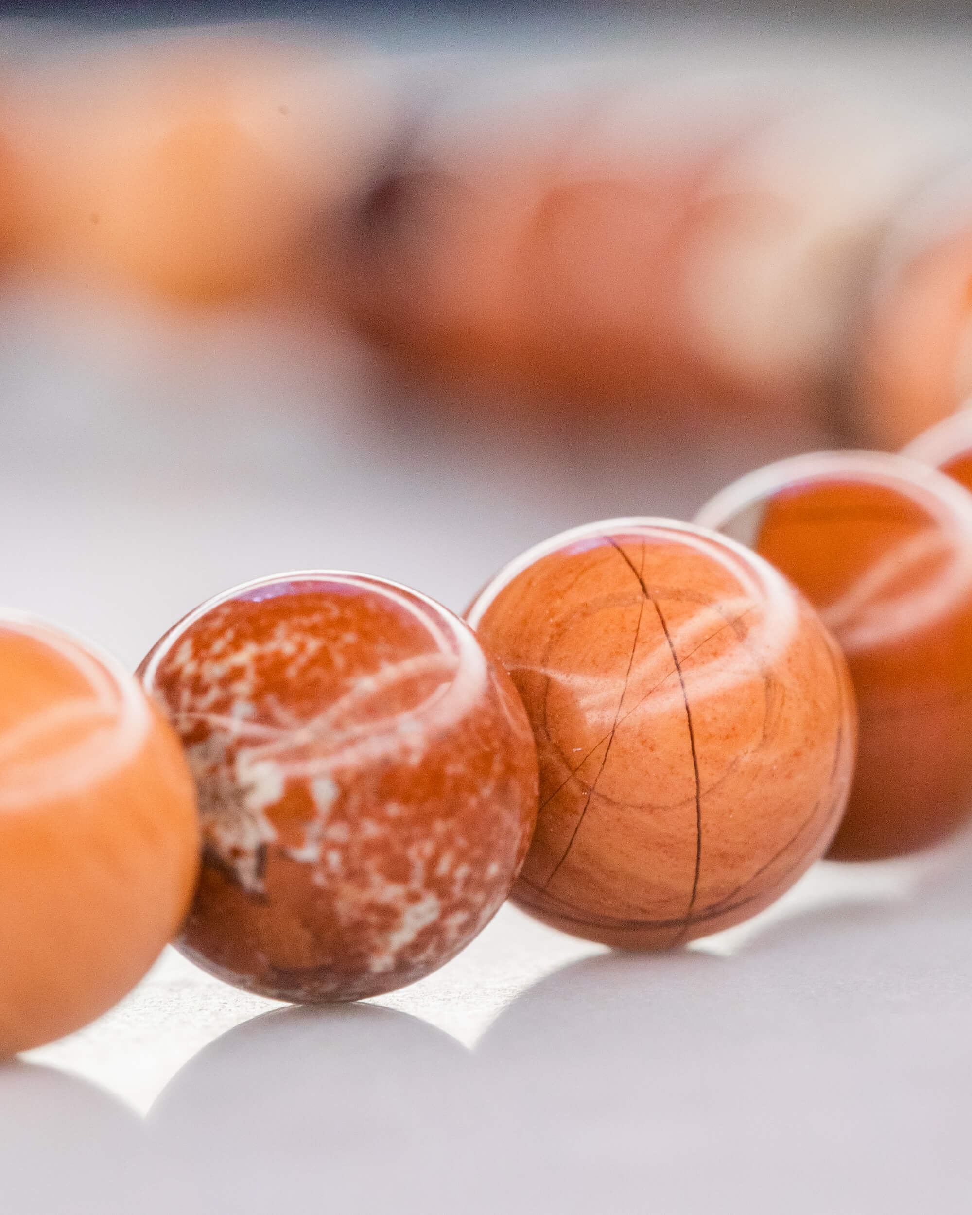 Codificador de Mano Jaspe Rojo 34 cm - Presencia y Raíz Viva (Agesta)