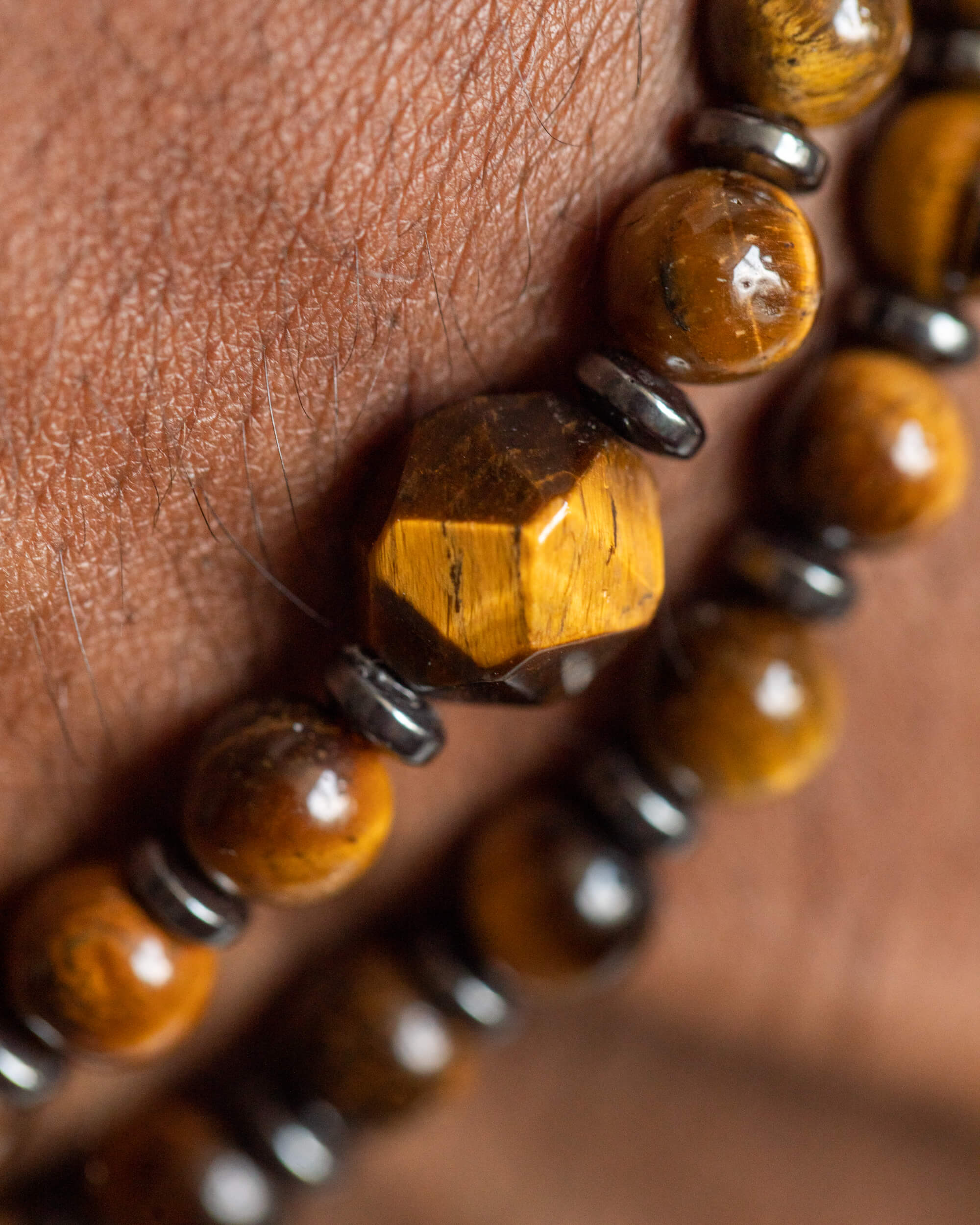 Codificador de Mano Ojo de Tigre y Hematita 32 cm - Protección y Eje (Agesta)