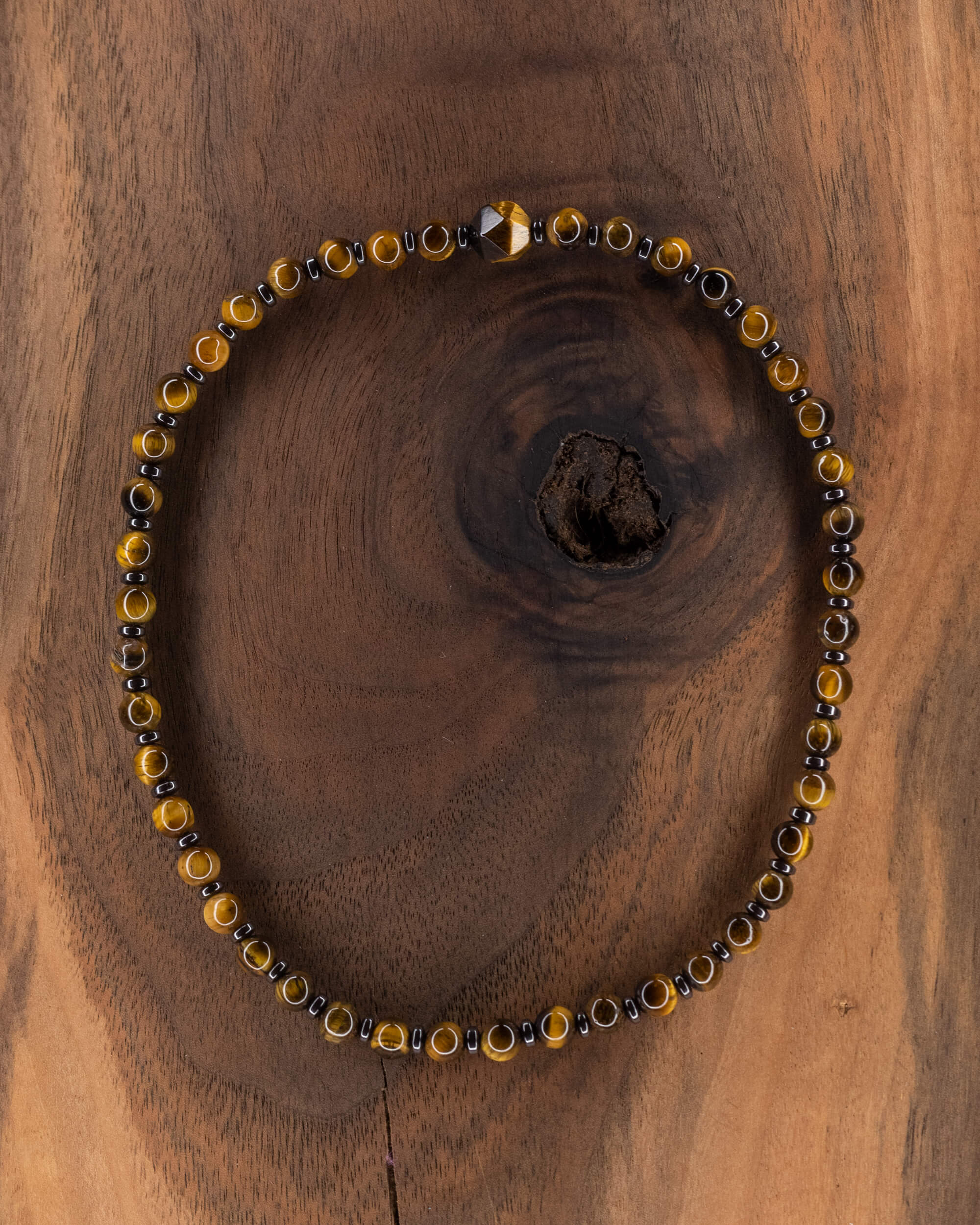 Codificador de Mano Ojo de Tigre y Hematita 32 cm - Protección y Eje (Agesta)