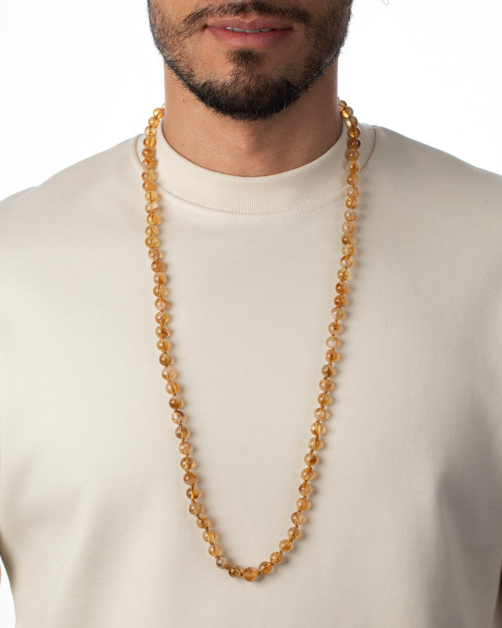 Codificador Doble de Citrino puesto, cayendo sobre el pecho