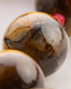 Detalle macro de una cuenta de Pietersita del Japa Mala Fuego