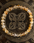 Pulsera de Citrino de 6 mm, pieza completa sobre disco decorativo oscuro