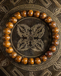 Pulsera de Jaspe Piel de Elefante de 8 mm, pieza completa sobre disco grabado oscuro