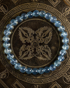 Pulsera de Aguamarina Santa María de 6 mm, pieza completa en círculo sobre placa grabada