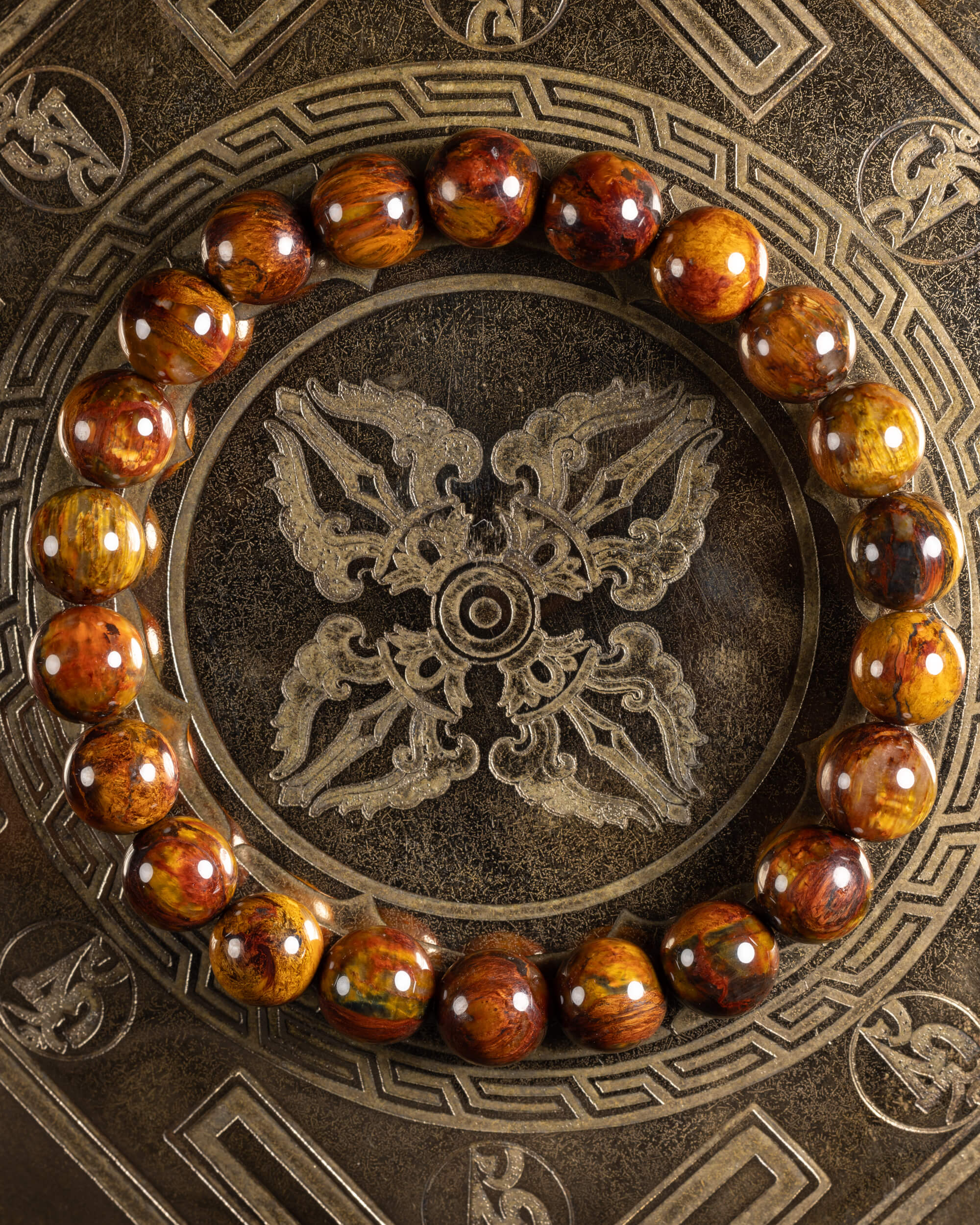 Pulsera de Pietersita de 9 mm, pieza completa sobre disco grabado