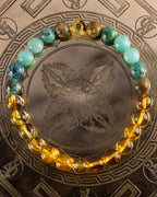 Pulsera Huitzilopochtli de Turquesa, Amazonita y Ámbar, pieza completa sobre disco grabado