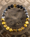 Pulsera Horus de 8 mm con Ámbar, Turmalina Negra, Obsidiana Copo de Nieve y Cuarzo Turmalinado
