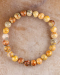 Pulsera de Ágata Mexicana de 8 mm, pieza completa en círculo sobre superficie clara