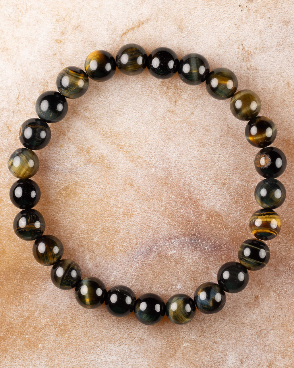 Pulsera de Ojo de Tigre Bicolor de 8 mm, pieza completa en círculo sobre piedra clara