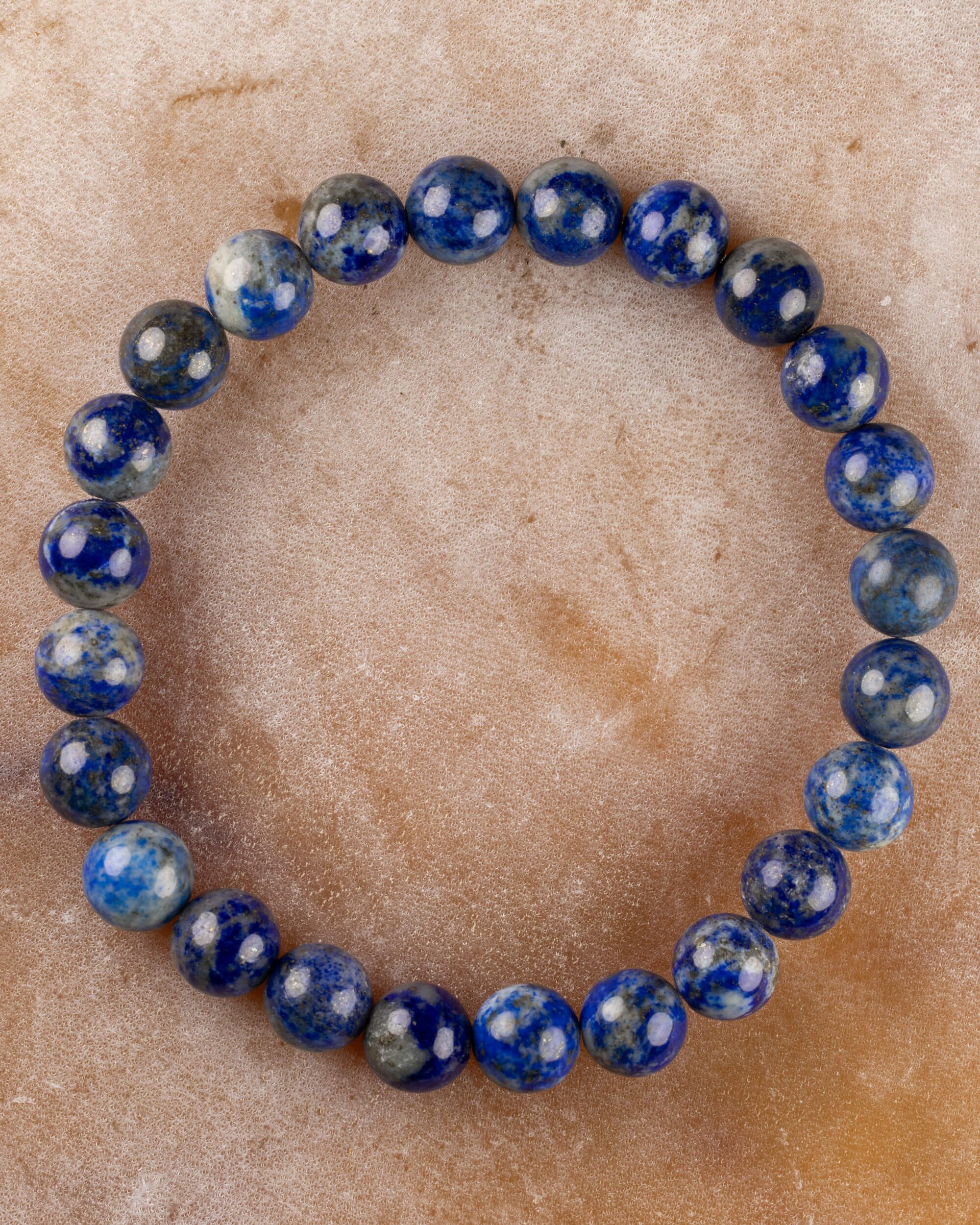 Pulsera de Lapislázuli de 8 mm, pieza completa en círculo sobre piedra clara