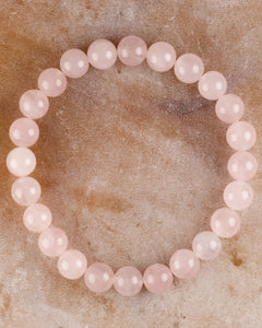 Pulsera de Cuarzo Rosa de 8 mm, pieza completa sobre superficie clara