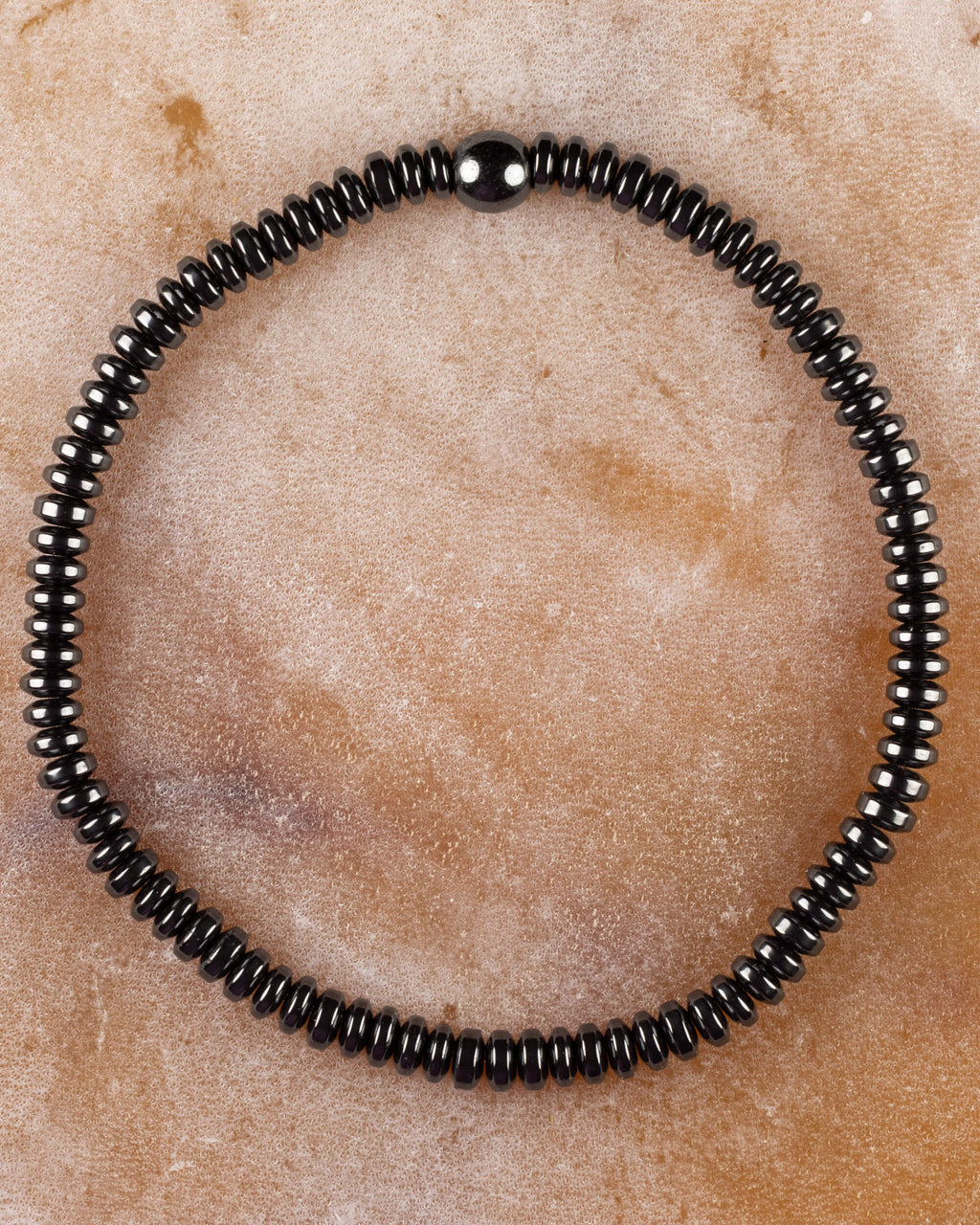 Pulsera de Hematita en discos de 2x4 mm, pieza completa circular con cuenta esferica central