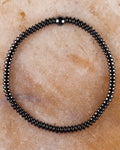 Pulsera de Hematita en discos de 2x4 mm, pieza completa circular con cuenta esferica central