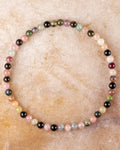 Pulsera de Turmalina Multicolor de 4 mm, pieza completa sobre superficie clara