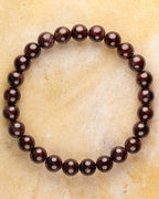 Pulsera de Granate Rojo de 8 mm, pieza completa sobre superficie clara