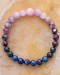 Pulsera Zodiacal Piscis de Kunzita, Lepidolita y Lapislázuli, pieza completa sobre superficie clara